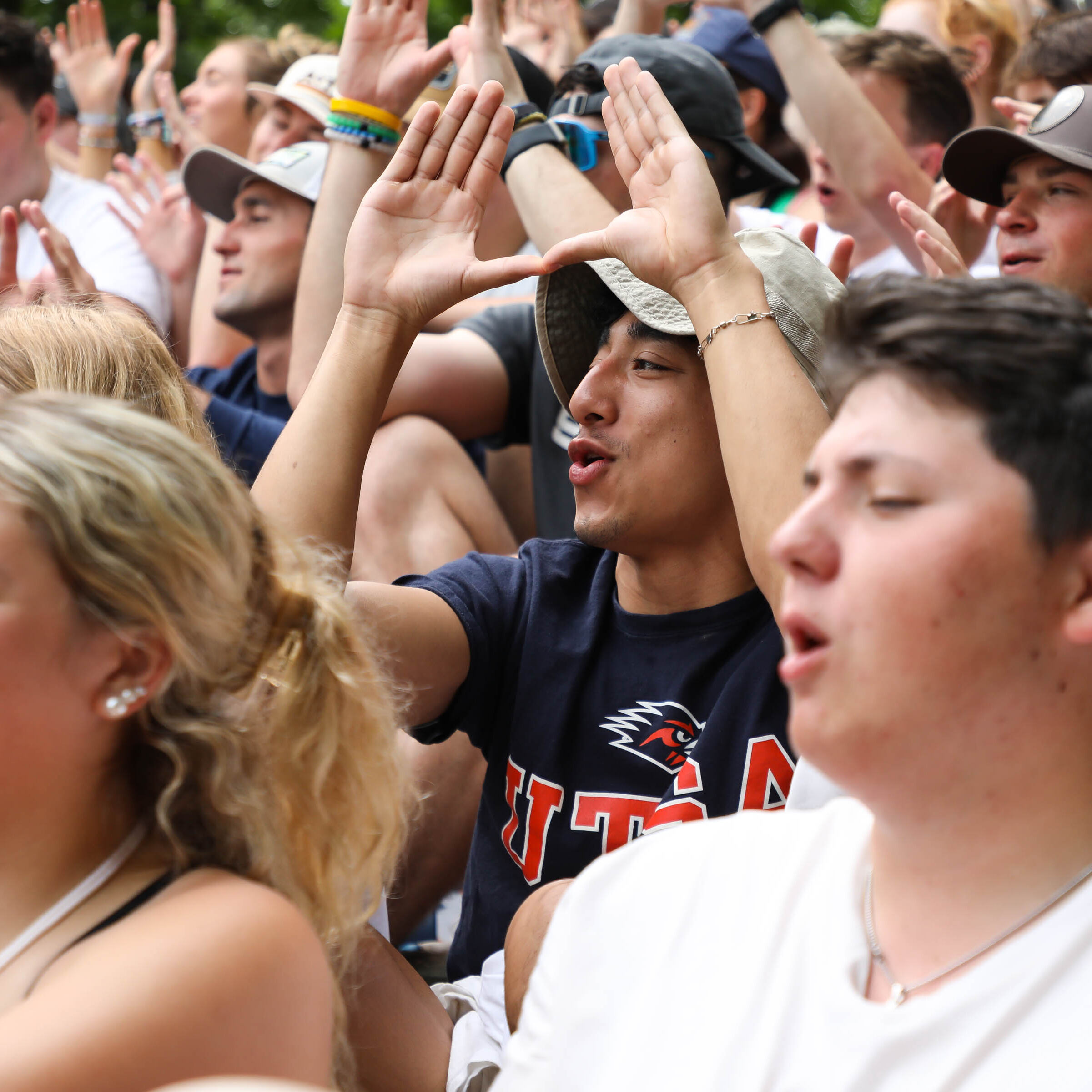 A University of Texas student having fun at summer camp