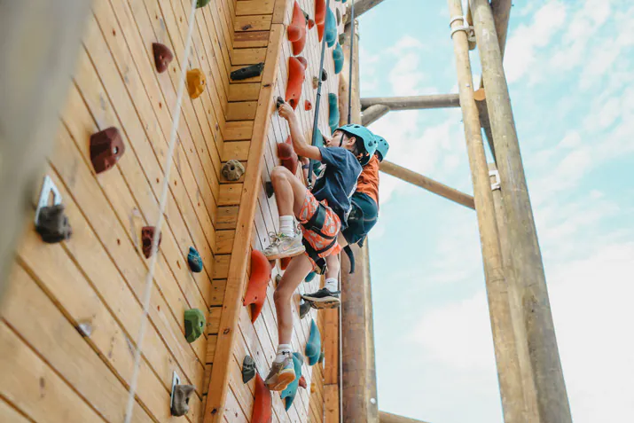 Campers on the climbing wall